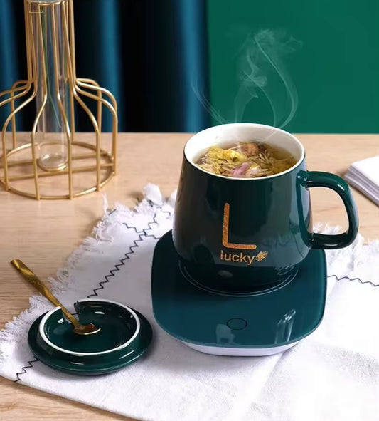 TAZA CON CALENTADOR ELÉCTRICO